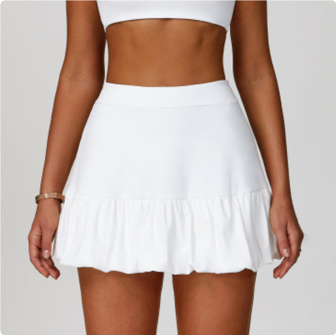 Quick-drying tennis skirt from M Chic Boutique, activewear with a fitted waistband and breathable fabric for sports and casual wear.