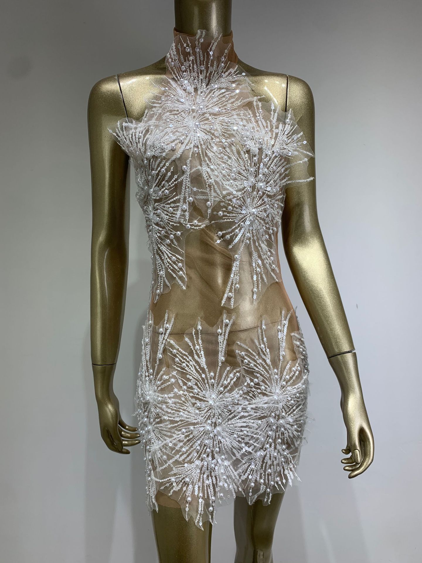 Black mesh lace short dress by M Chic Boutique with a fitted bodice and flared skirt, perfect for casual outings.
