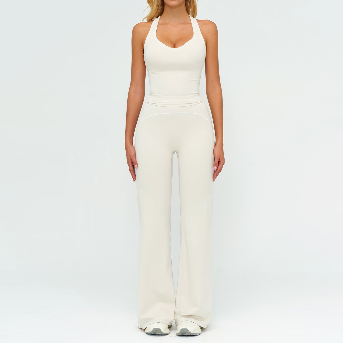 V-neck sleeveless gym set in activewear style by M Chic Boutique, shown on a mannequin, highlighting sporty and comfortable design