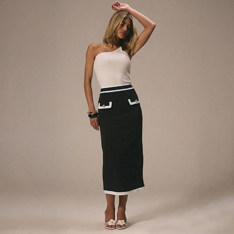 High-waisted pencil skirt in black from M Chic Boutique, featuring a sleek, form-fitting silhouette and knee-length design.