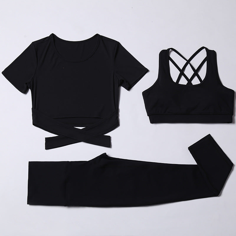 M Chic Boutique three-piece gym and yoga activewear set featuring a fitted top, leggings, and matching sports bra for workout comfort.