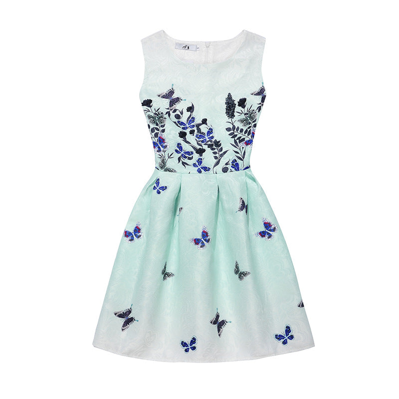 M Chic Boutique printed A-line dress featuring a vibrant floral pattern and a flattering silhouette on a mannequin.