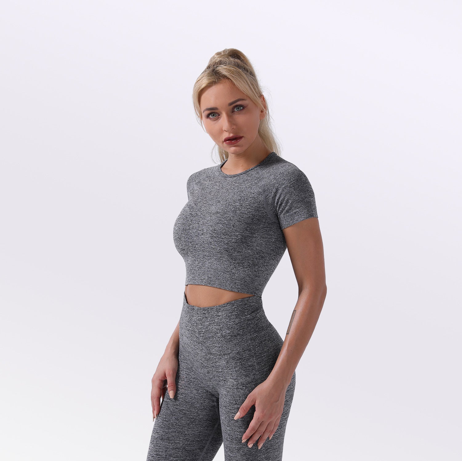 Seamless Botee yoga and gym activewear set by M Chic Boutique, featuring a fitted sleeveless top and matching leggings for workout comfort.