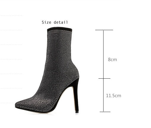 Pointed rhinestone high heel boots from M Chic Boutique featuring a sleek design and sparkling embellishments.