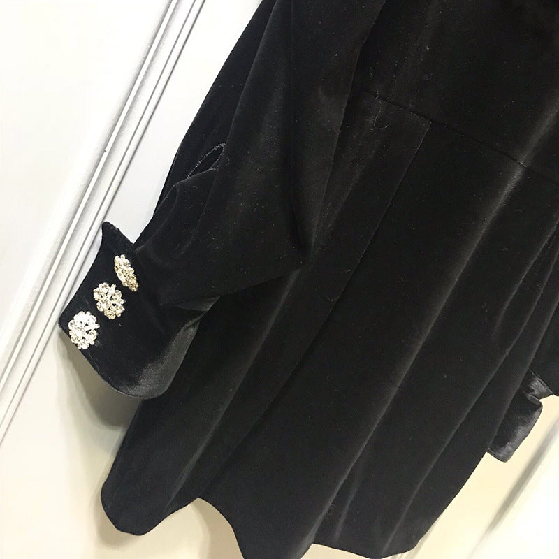 Elegant M Chic Boutique dress with a flowing design and subtle details, perfect for formal occasions.