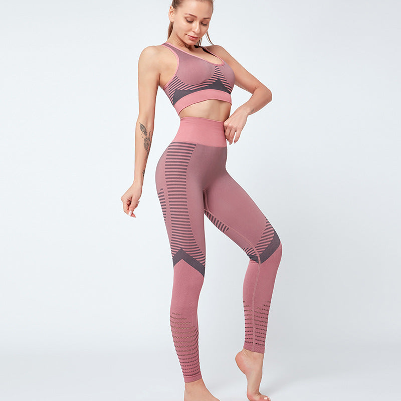 Black seamless yoga and gym sportswear activewear set by M Chic Boutique, featuring a fitted sports bra and high-waisted leggings.