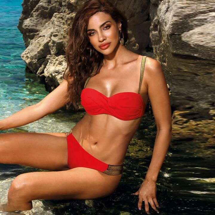 Mid-waist bandeau bikini swim suit in vibrant colors, featuring a sleek design and minimal support, perfect for beach or poolside.