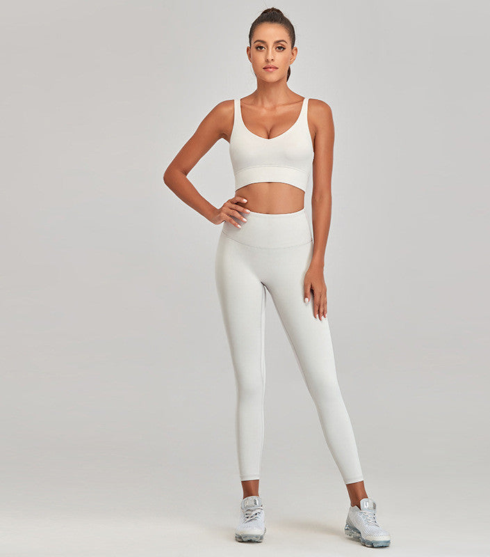 M Chic Boutique exercise suit in sleek activewear style, featuring a fitted top and matching leggings for workout comfort.