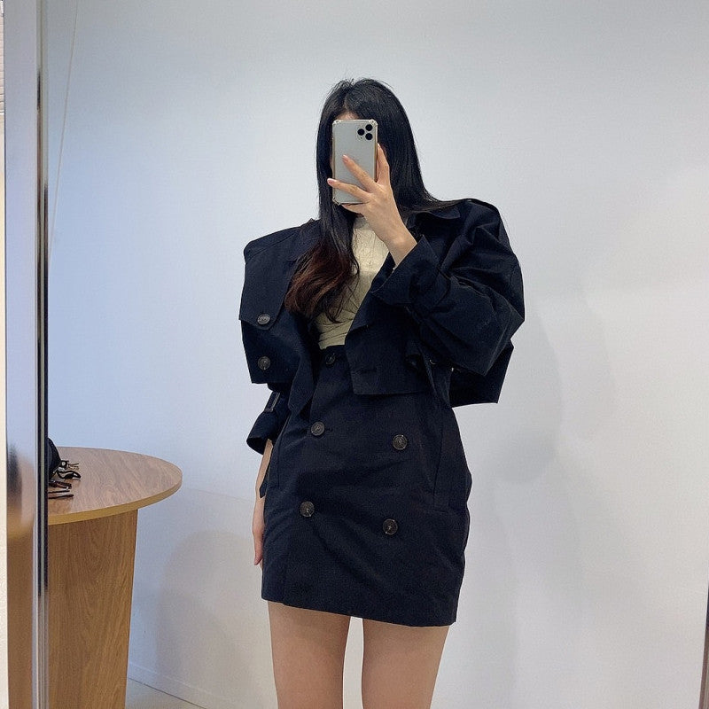 Elegant two-piece double-breasted suit from M Chic Boutique, featuring a tailored blazer and matching trousers.