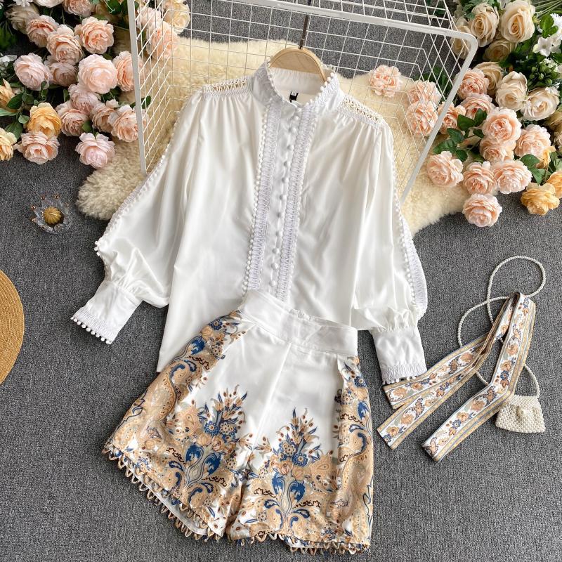 Two-piece French Temperament Suit from M Chic Boutique featuring a stylish blazer and tailored trousers in elegant fabric.