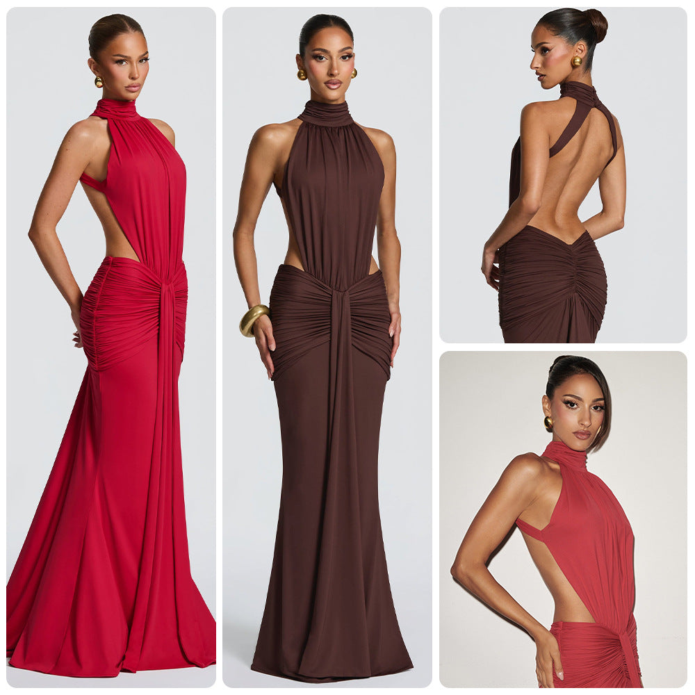Halterneck pleated slim-fit dress by M Chic Boutique featuring a stylish design with a fitted silhouette and elegant pleats.