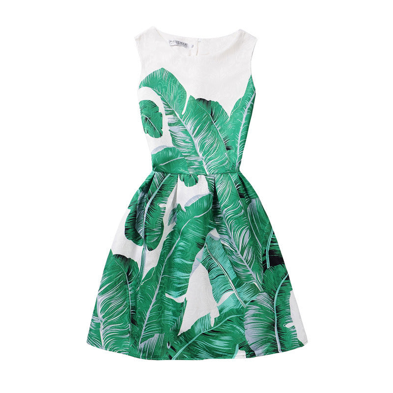 M Chic Boutique printed A-line dress featuring a vibrant floral pattern and a flattering silhouette on a mannequin.