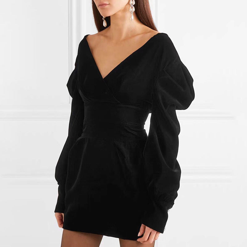 Elegant dress from M Chic Boutique featuring a flowing design and sophisticated silhouette in a soft fabric.