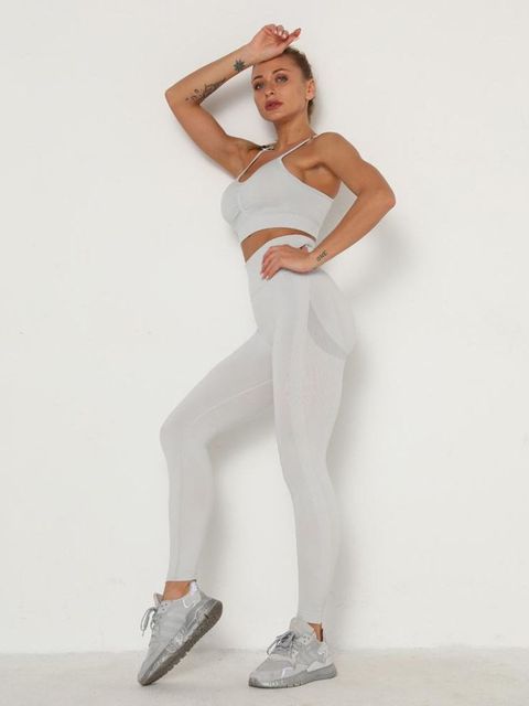 Breathable M Chic Boutique activewear gym set featuring a fitted sports bra and matching leggings for workout comfort.