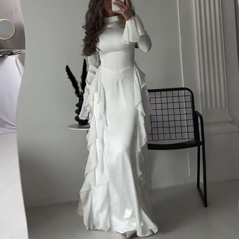 Round-neck flared sleeves dress by M Chic Boutique featuring a stylish design and elegant silhouette.
