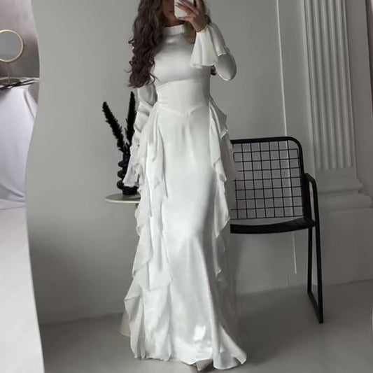 Round-neck flared sleeves dress by M Chic Boutique featuring a stylish design and elegant silhouette.