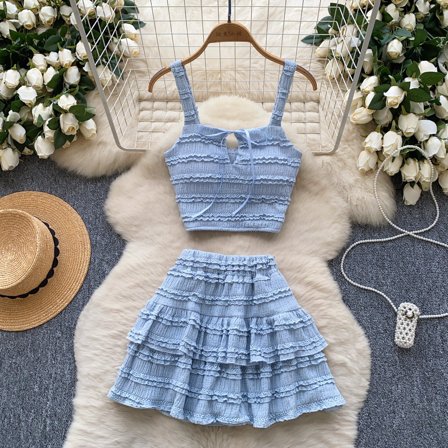 Two-piece M Chic Boutique square-neck slip dress set with high waist and pleated ruffled hem, shown on a model.