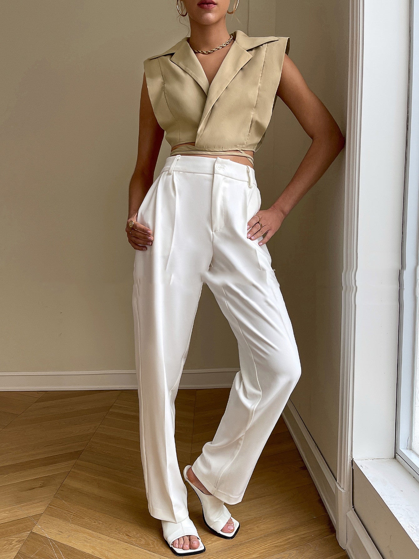 Solid color suit top in a sleek design, featuring a fitted silhouette from M Chic Boutique, displayed on a hanger.