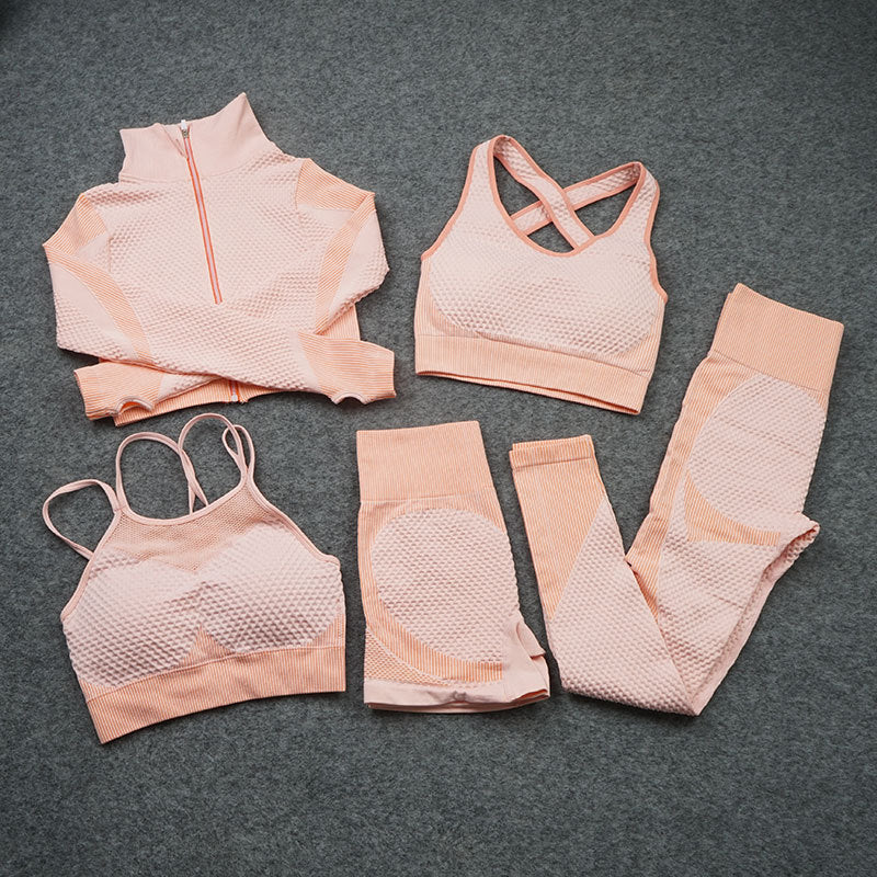 Quick-drying knitted gym suit by M Chic Boutique, activewear set with fitted top and matching leggings for workout comfort.