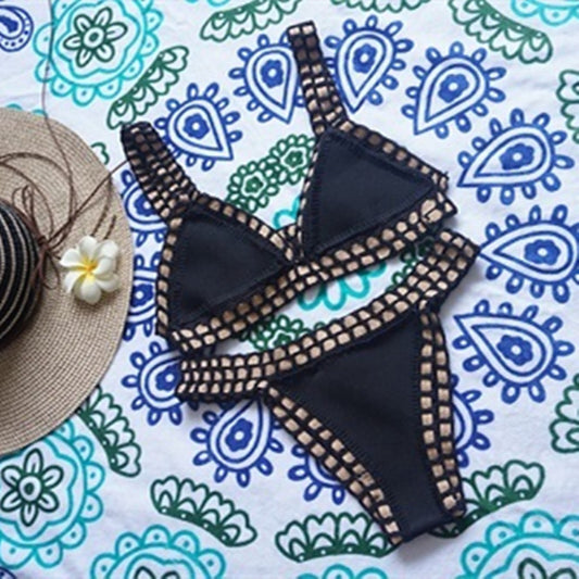 Woven bikini set swim suit by M Chic Boutique featuring a stylish, patterned two-piece design on a model