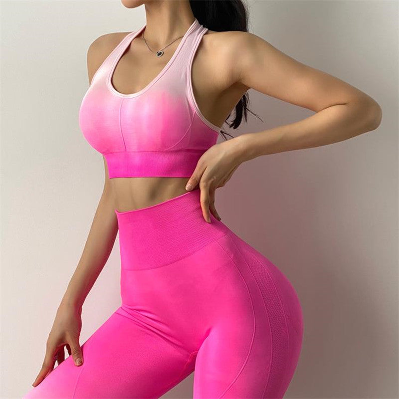 Two-piece seamless M Chic Boutique activewear yoga and gym suit in black with high-waisted leggings and a matching sports bra.