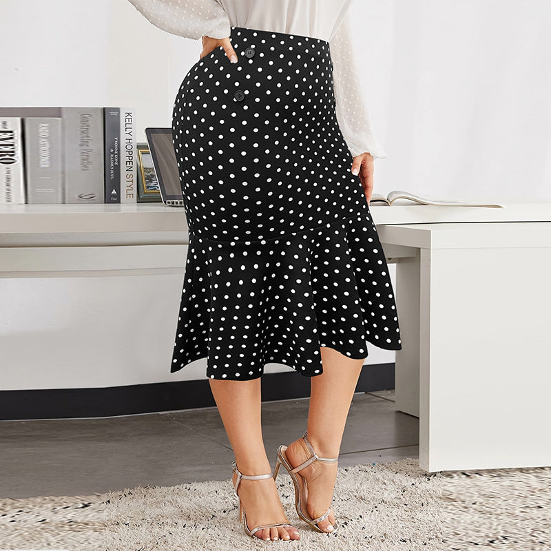 Plus size slimming mermaid midi skirt in black, featuring a fitted design and flared hem from M Chic Boutique.