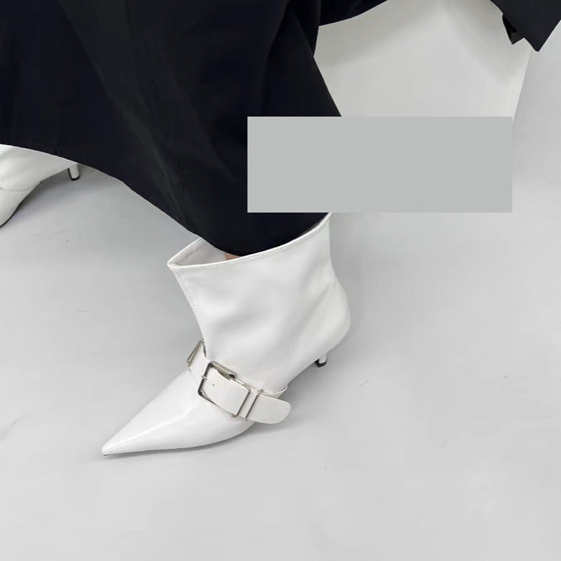 Black high heel pointed ankle boots with a sleek design from M Chic Boutique, featuring a stylish silhouette and tapered toes.