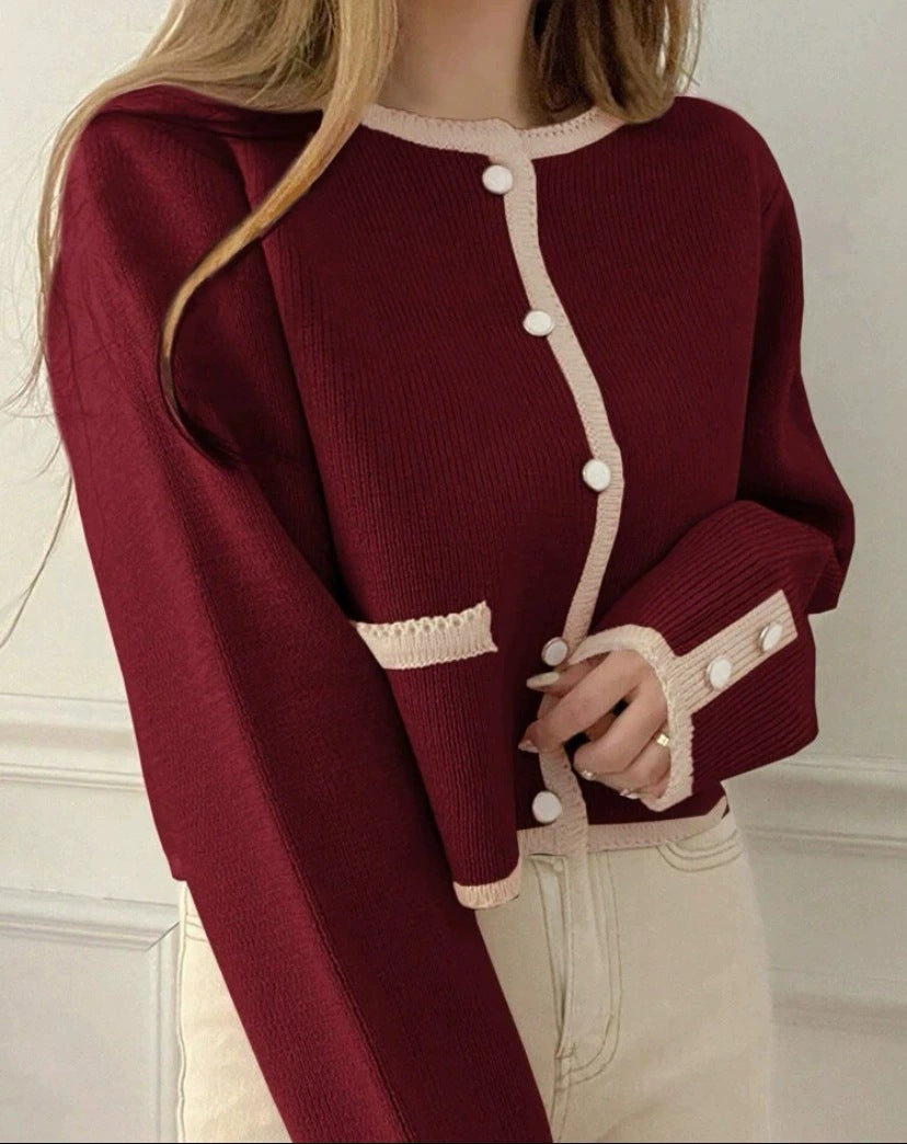Single-breasted knitted cardigan coat in a soft fabric, featuring a classic design by M Chic Boutique.