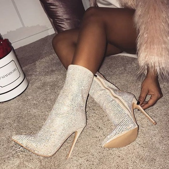 Pointed high heel boots with rhinestone detailing from M Chic Boutique, showcasing a stylish and elegant design.