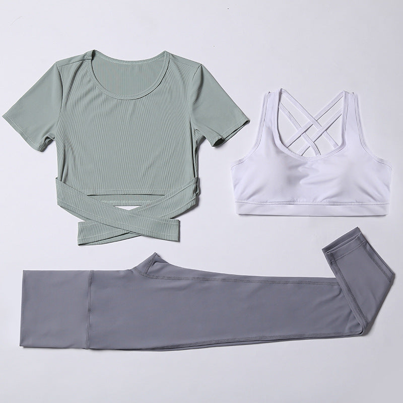 Three-piece M Chic Boutique activewear yoga and gym suit with matching top, leggings, and sports bra, perfect for fitness and workouts.