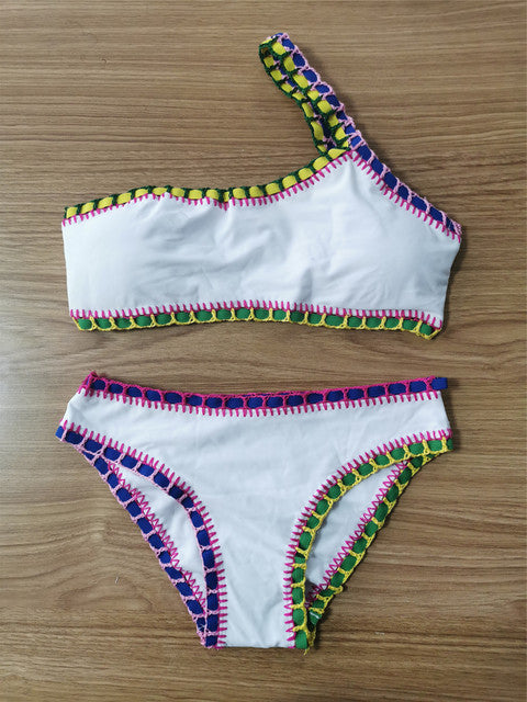 Woven bikini set from M Chic Boutique featuring a stylish swim suit with a woven design, perfect for beach or poolside wear.