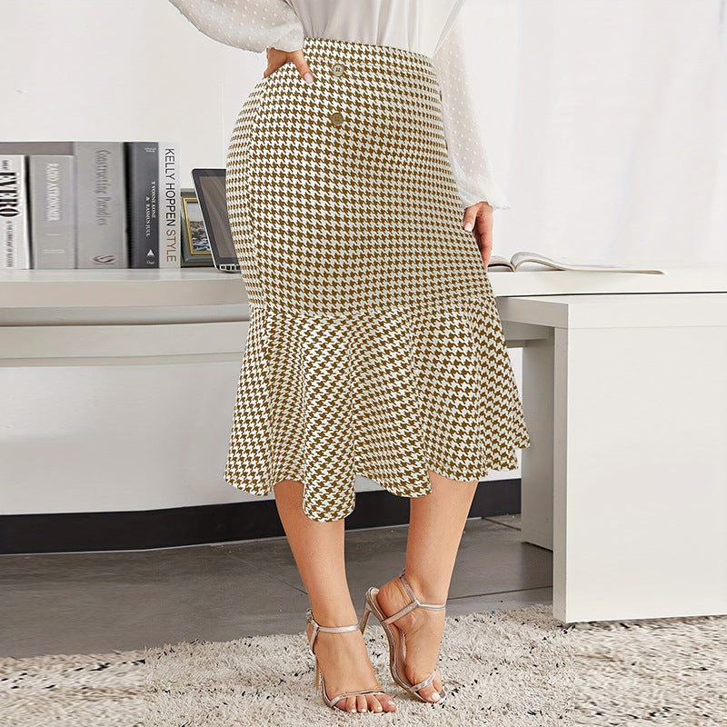 Plus size slimming mermaid midi skirt in black with a fitted silhouette from M Chic Boutique, displayed on a model.
