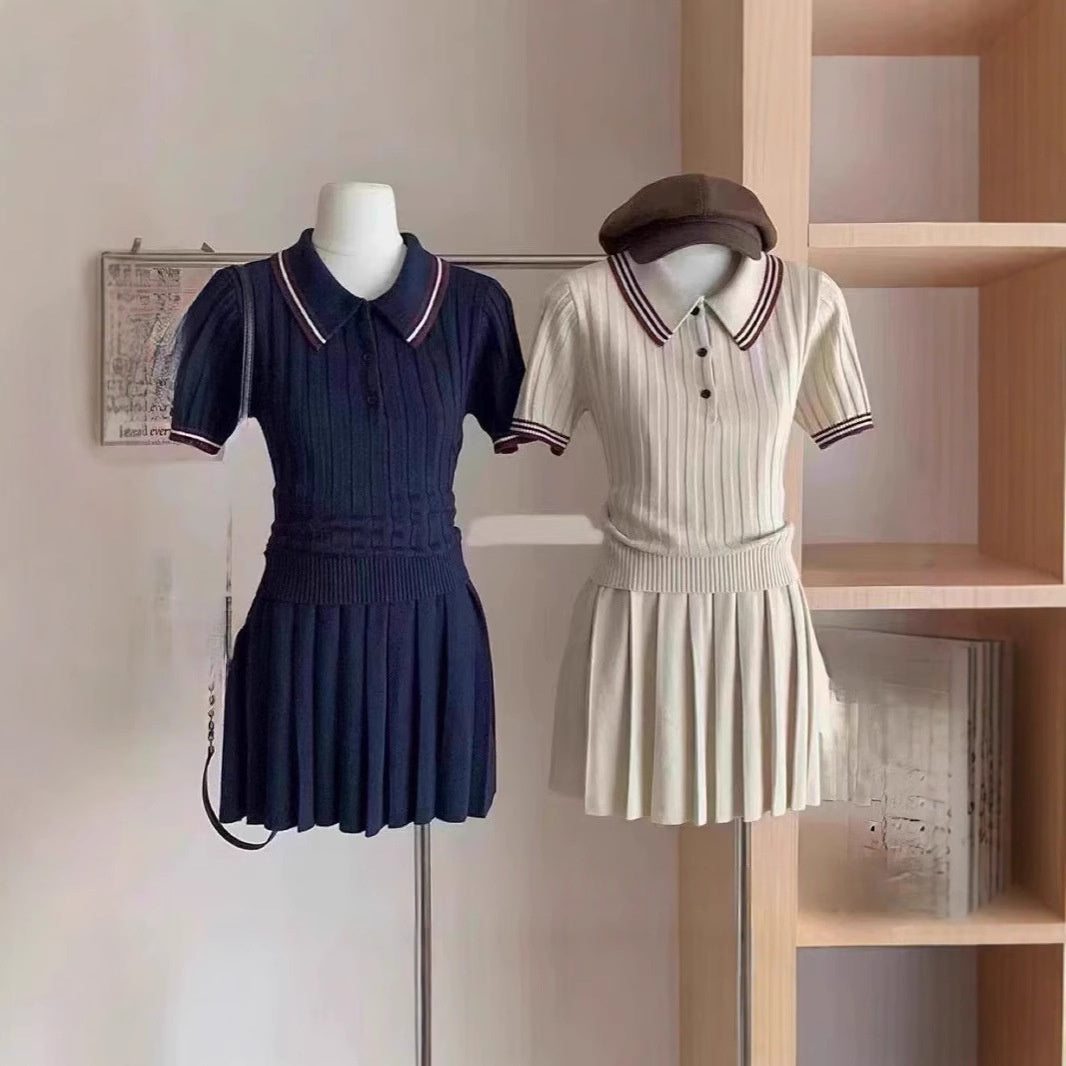 Short knitted pleated skirt two-piece set from M Chic Boutique, featuring a matching top and skirt in soft, textured fabric.