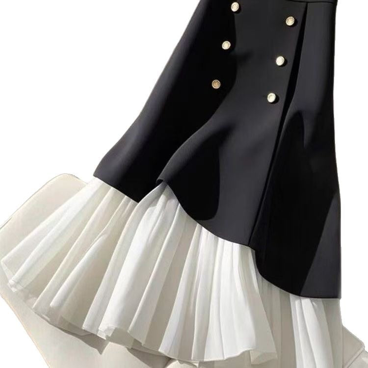 Splicing half skirt with buttons from M Chic Boutique, featuring a stylish design and unique color blocking.