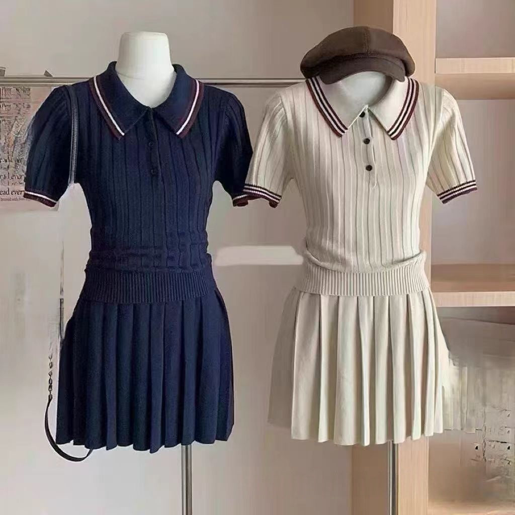 Water-themed image of a two-piece set featuring a short knitted pleated skirt and matching top from M Chic Boutique.