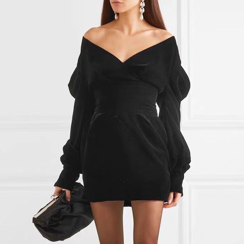 Elegant M Chic Boutique dress featuring a flowing silhouette and delicate fabric, perfect for special occasions.