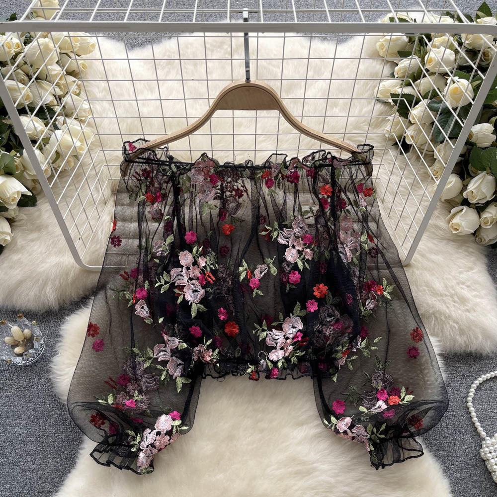 Elegant off-shoulder mesh embroidery transparent shirt from M Chic Boutique, featuring delicate lace details and a stylish fit.
