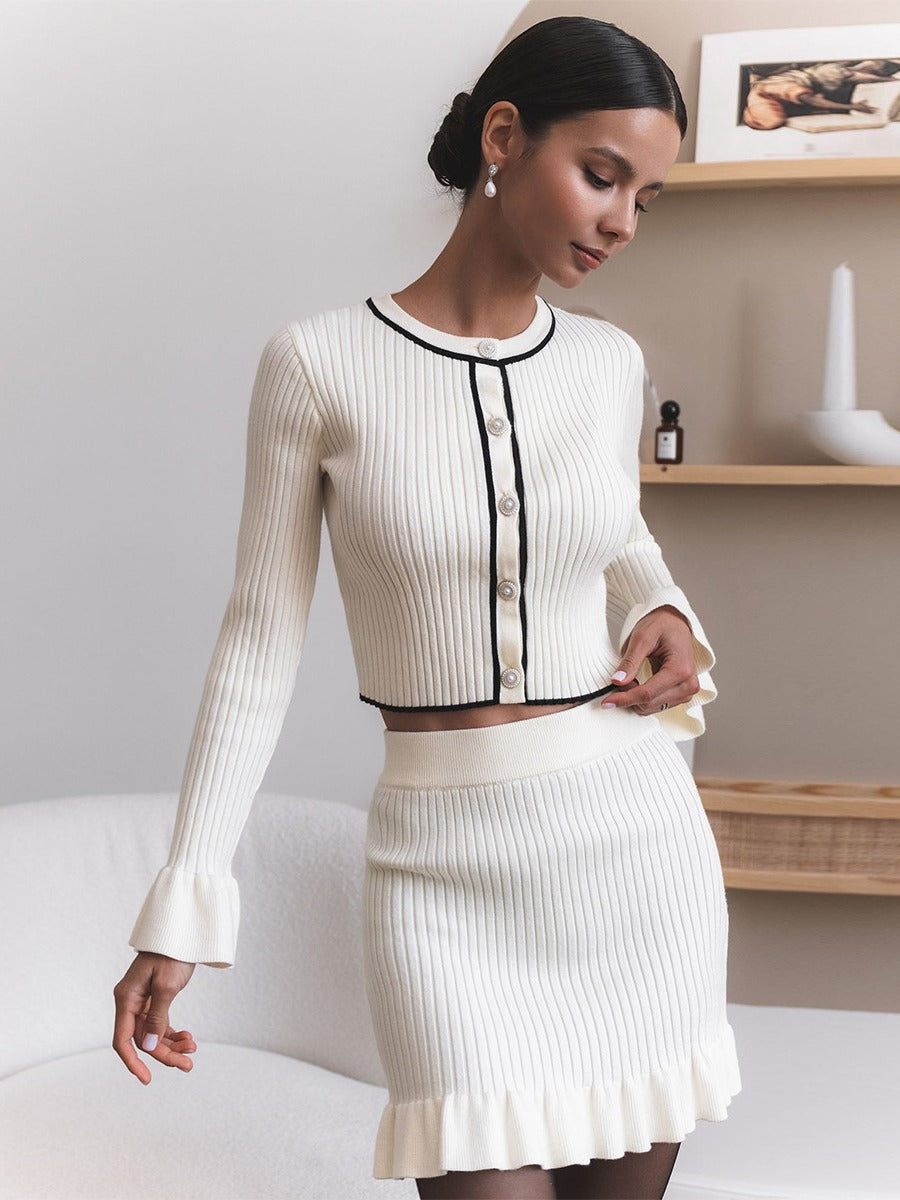 M Chic Boutique knitted two-piece set featuring a cozy sweater and matching skirt in a stylish design.