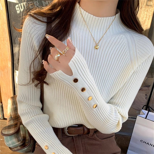 Light gray semi-high collar sweater by M Chic Boutique featuring a cozy knit design and stylish fit.