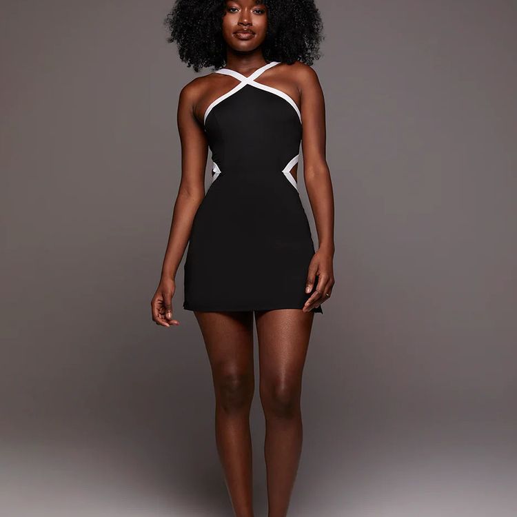 Minimalist one-piece tennis skirt from M Chic Boutique, activewear with a sleek, simple design suitable for sports and casual wear.