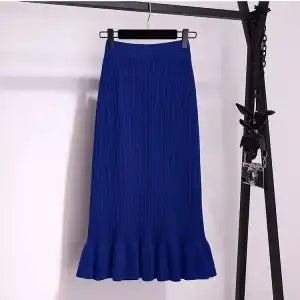 Ruffled high waisted skirt by M Chic Boutique, featuring layered ruffles and a flattering silhouette in a soft fabric.