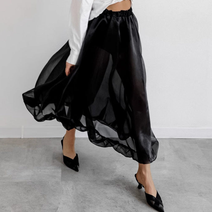Black mesh high waist skirt from M Chic Boutique, featuring a flowy design and layered texture.