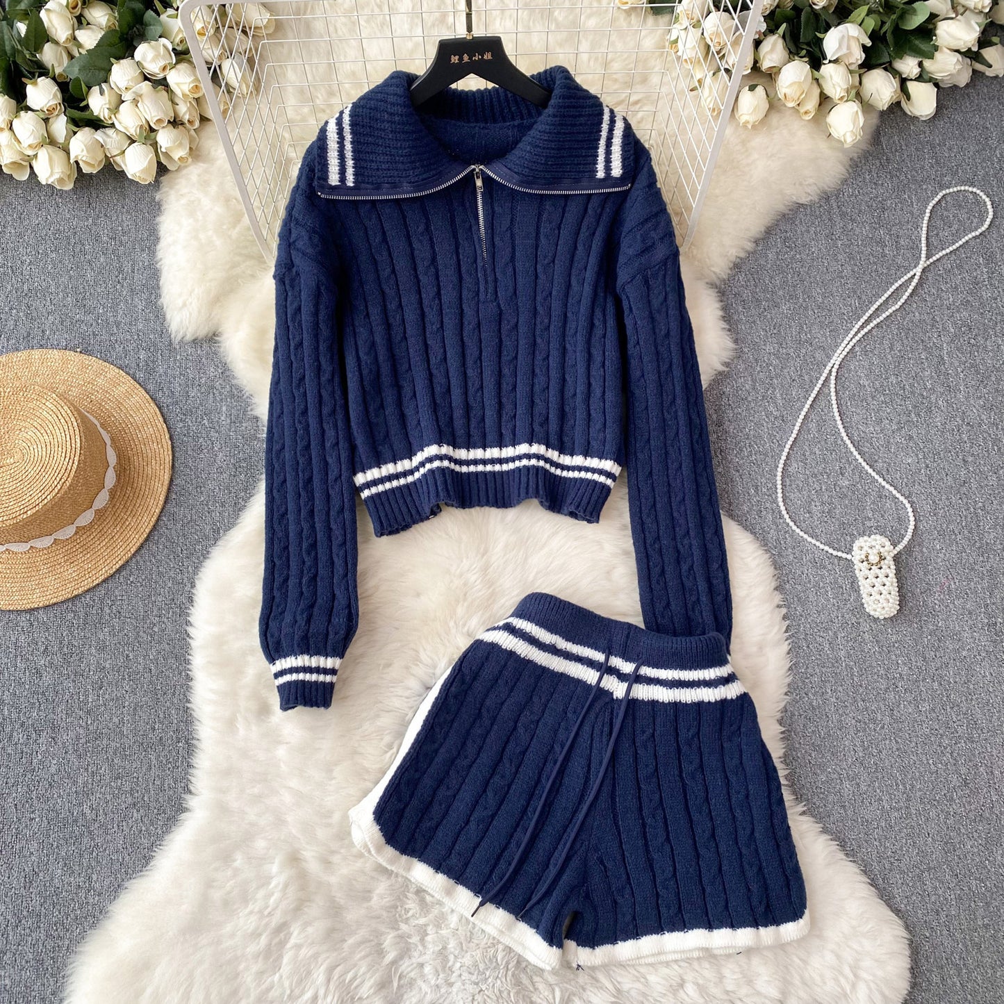 Breasted-collar striped sweater and shorts set in soft fabric, featuring a relaxed fit and chic design by M Chic Boutique.