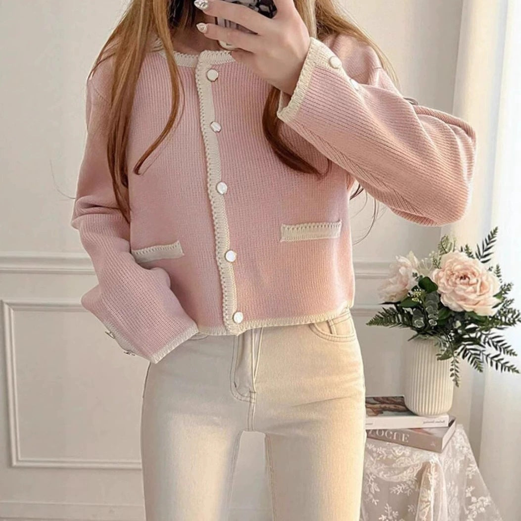 Single-breasted knitted cardigan coat in soft fabric, showcasing a relaxed fit and classic design by M Chic Boutique.
