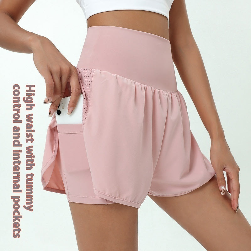 Women’s gym running exercise shorts in activewear style by M Chic Boutique, featuring lightweight fabric and a comfortable fit.