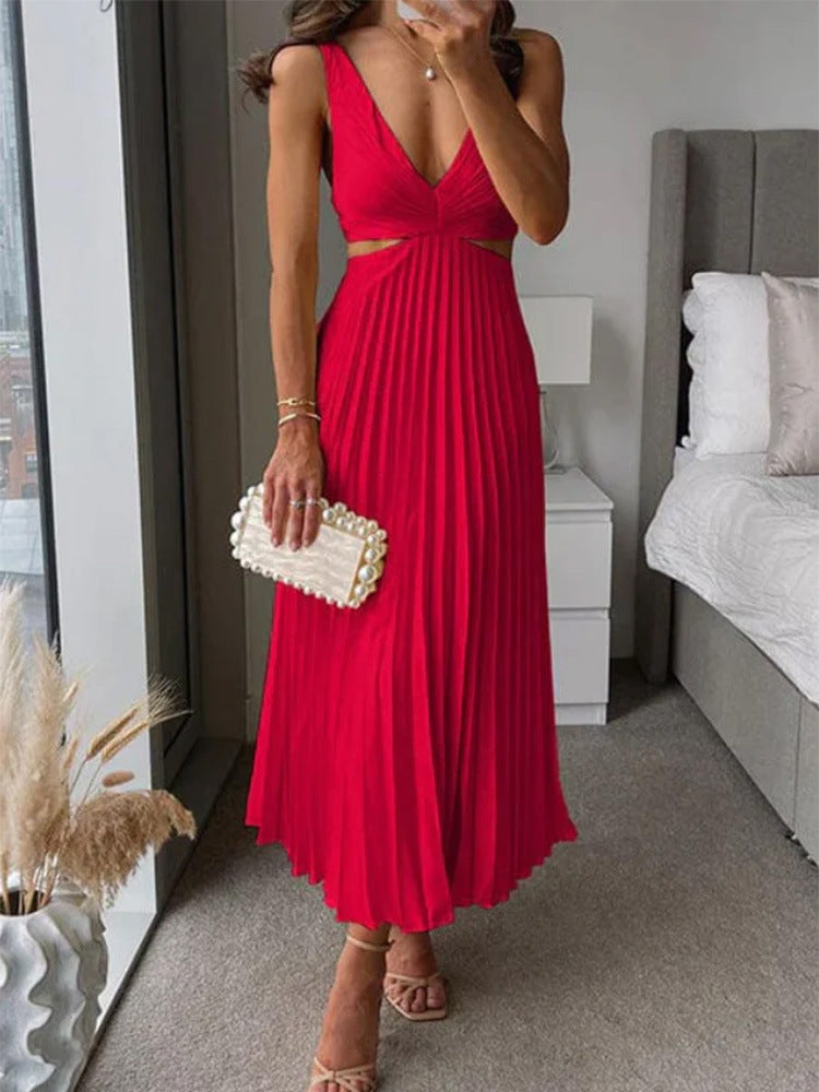 M Chic Boutique suspender pleated long dress, flowy fabric with wide straps and a fitted waist, displayed on a mannequin.