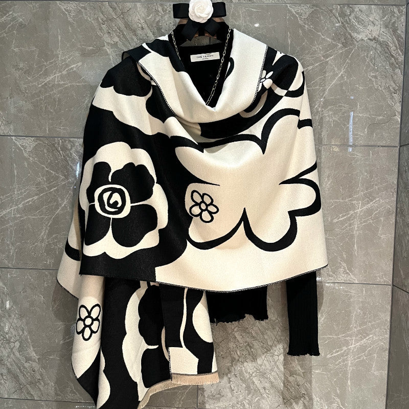 Black and white versatile scarf from M Chic Boutique, stylish accessories with high-quality fabric and classic pattern.