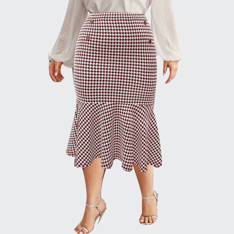 Plus size slimming mermaid midi skirt in a stylish silhouette from M Chic Boutique, showcasing a fitted waist and flared hem.