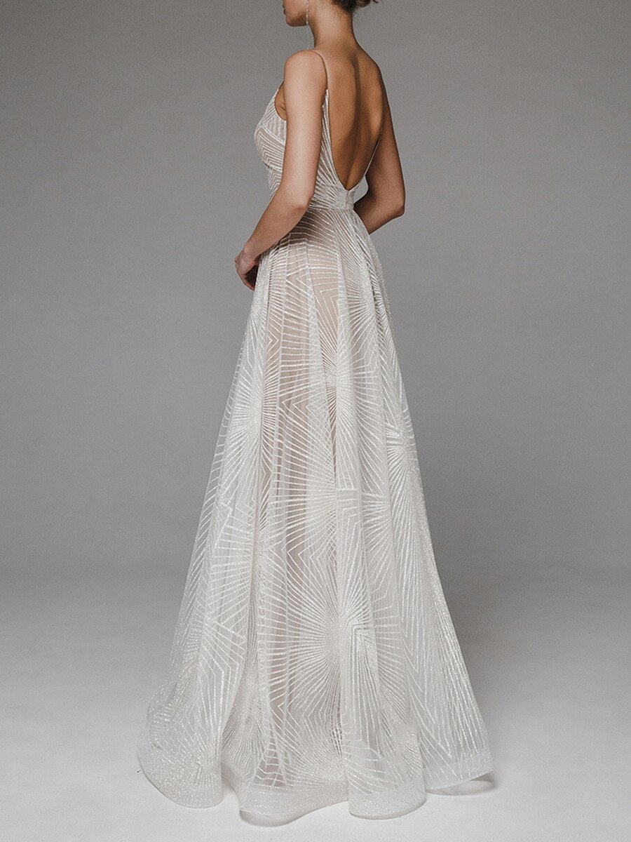 European Sling embroidered sleeveless dress by M Chic Boutique, featuring intricate embroidery and a stylish sling design.