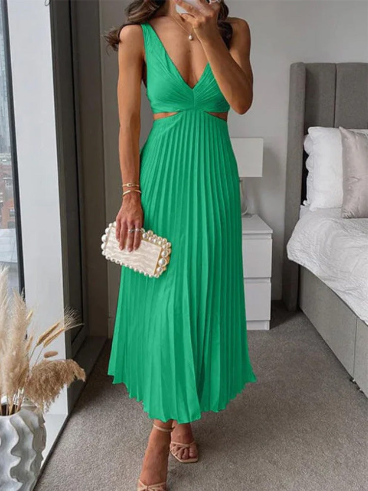 M Chic Boutique suspender pleated long dress showing a flowing fabric and stylish design on a model.